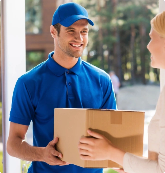 6 Delivery man handing a package to a customer.